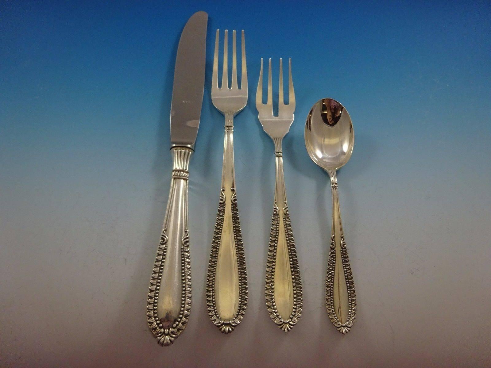 Gran Paris by Camusso (Peru) sterling silver flatware set of 133 pieces includes: 12 dinner knives, 9 1/4