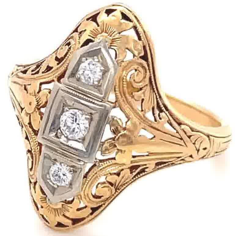 If you like delicate antique jewelry, consider this charming Art Deco Diamond Yellow Gold Three Stone Navette Ring. There is no other person like you, so you deserve a truly one of a kind ring! It features 3 transitional cut diamonds approximately