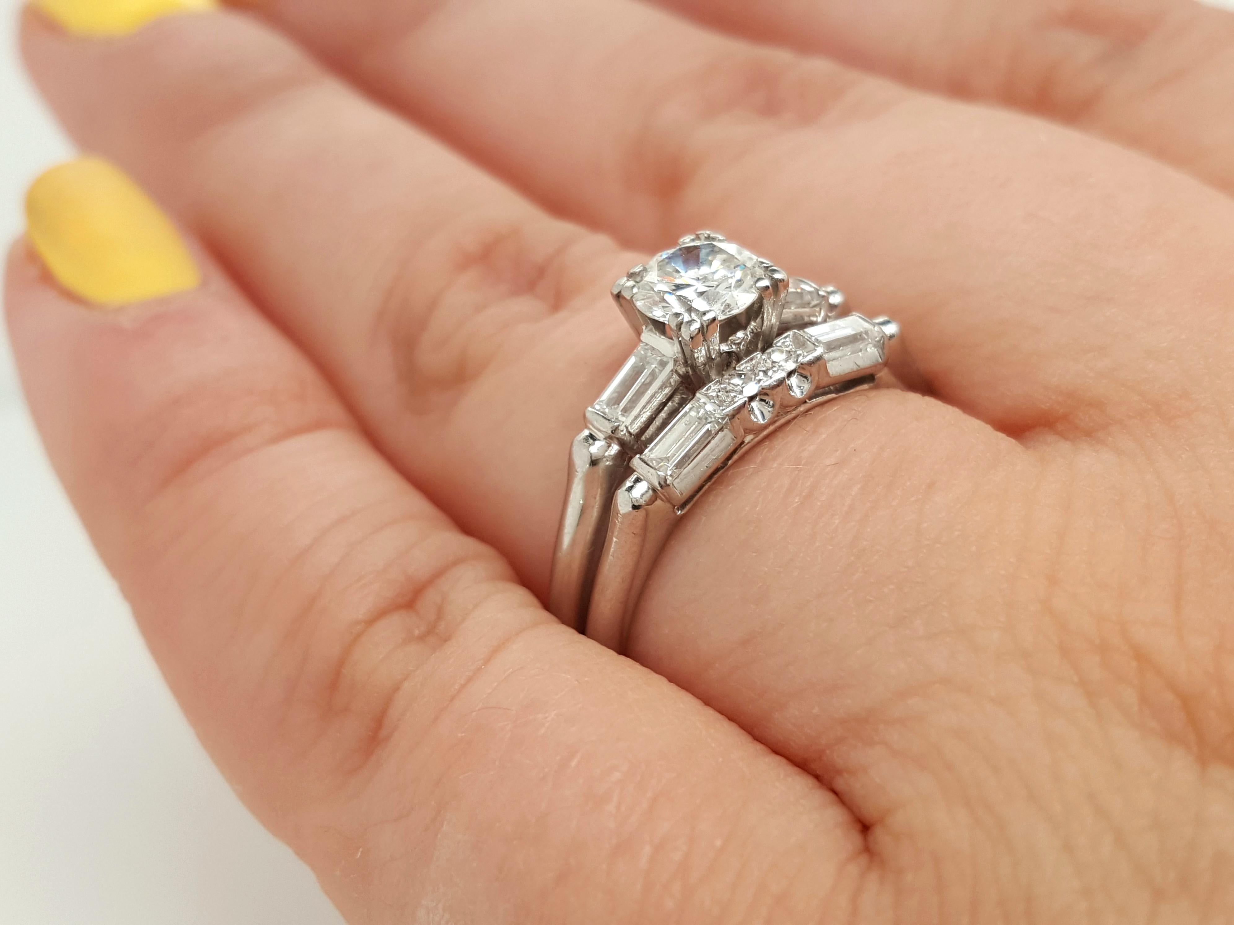 From the Iconic San Francisco jewelers, Granat Brothers, this classic platinum and diamond engagement ring features a round brilliant cut Diamond set in four fishtail prongs, weighing approximately .53 carats VS clarity I - J  in color, flanked by