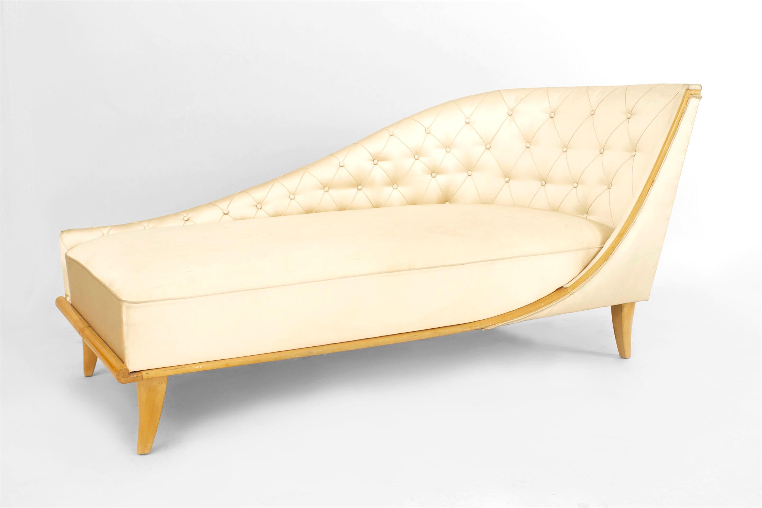 French Mid-Century (1940s) sycamore chaise lounge with champagne satin upholstery and tufted shaped side and back (p. 90 