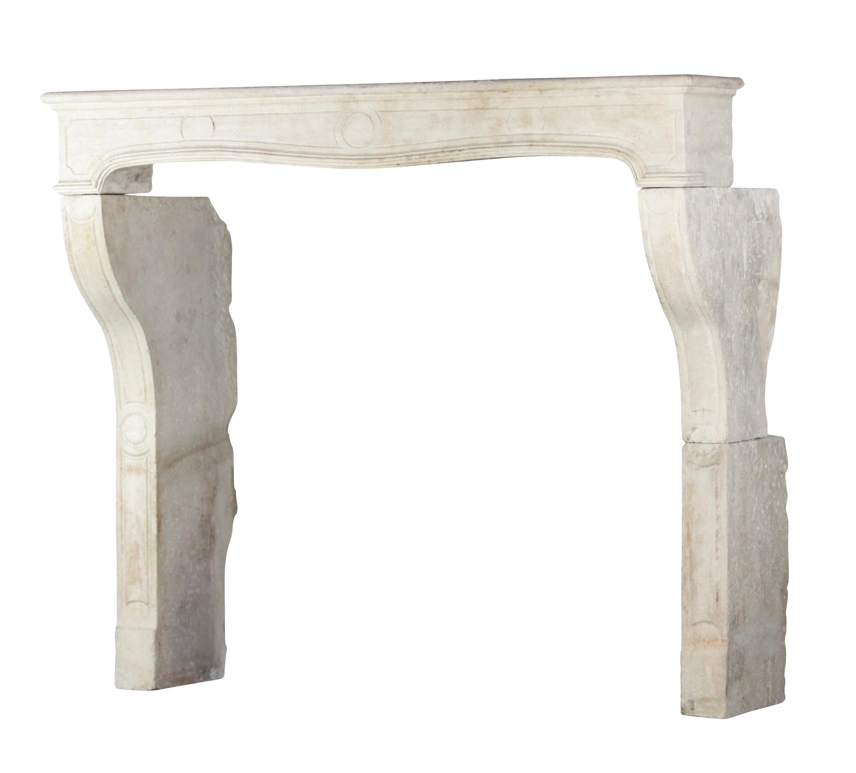 French 18th century period country style limestone fireplace surround. 
Elegant and not too rustic for a timeless modern interior design.
Measures:
181 cm exterior width 71,26 inch
157 cm exterior height 61,81 inch
148 cm interior width 58,27