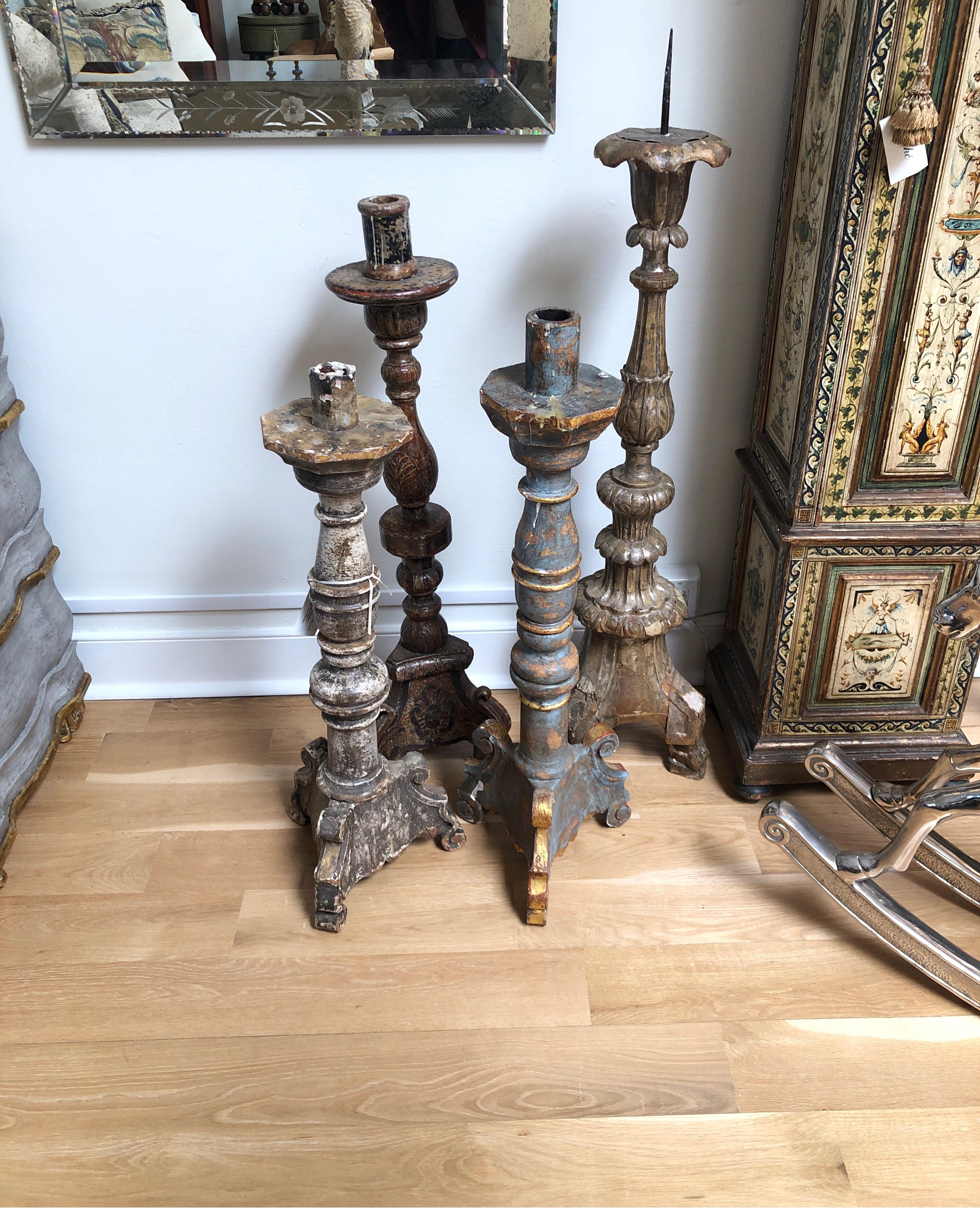 Grand 18th century painted Alter candlesticks/wood prickets. Beautiful patina in various colors and sizes.

Varying degrees of worming damage, etc. See images. 
Please confirm which piece you are interested in with offer. 

Sizes range from 32”