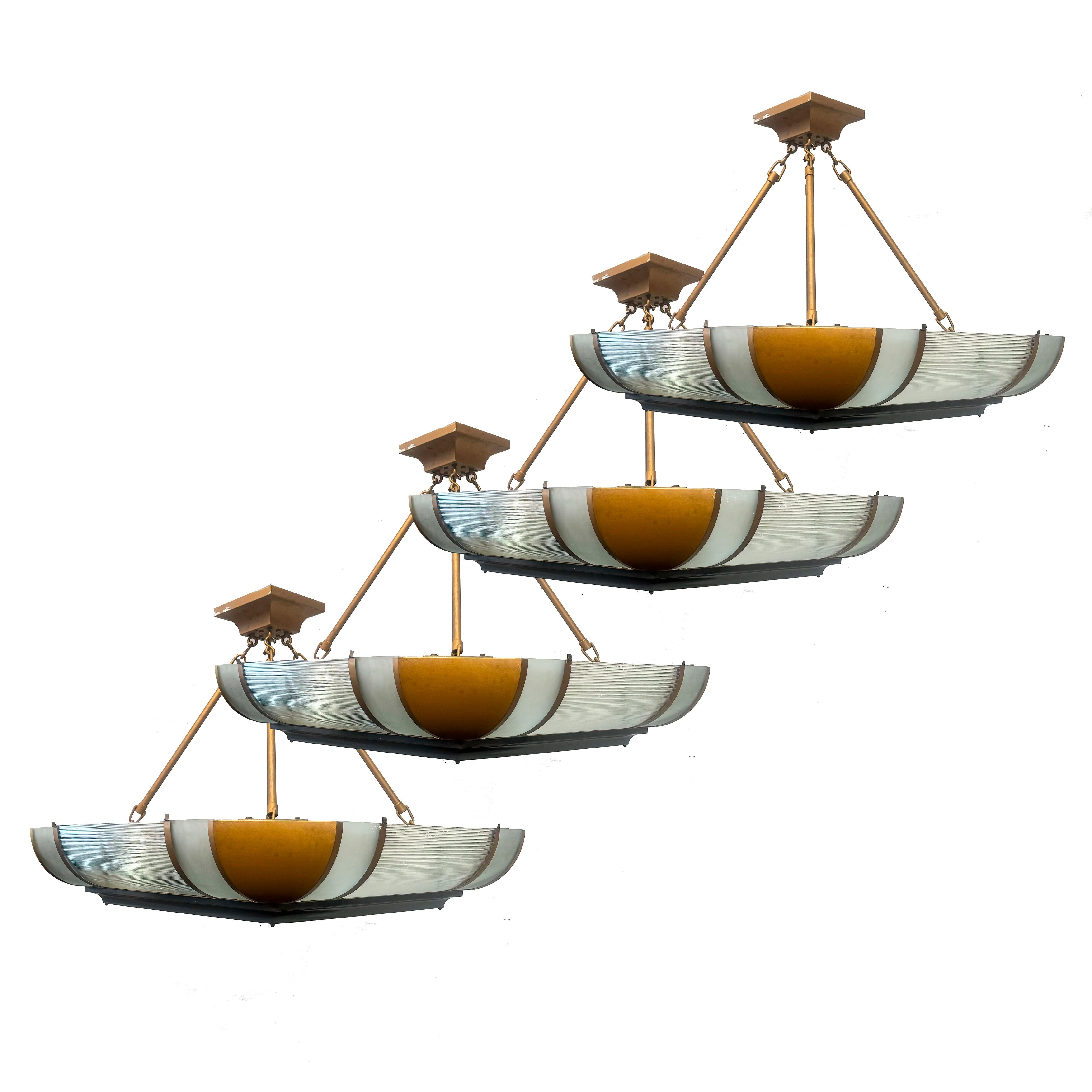 Four Art Deco original architectural lights  Price is per light

Constructed in 1938 by architects Gordon Jeeves and Hector O. Hamilton, this building was celebrated as Europe's largest office block at the time and marked a pioneering use of