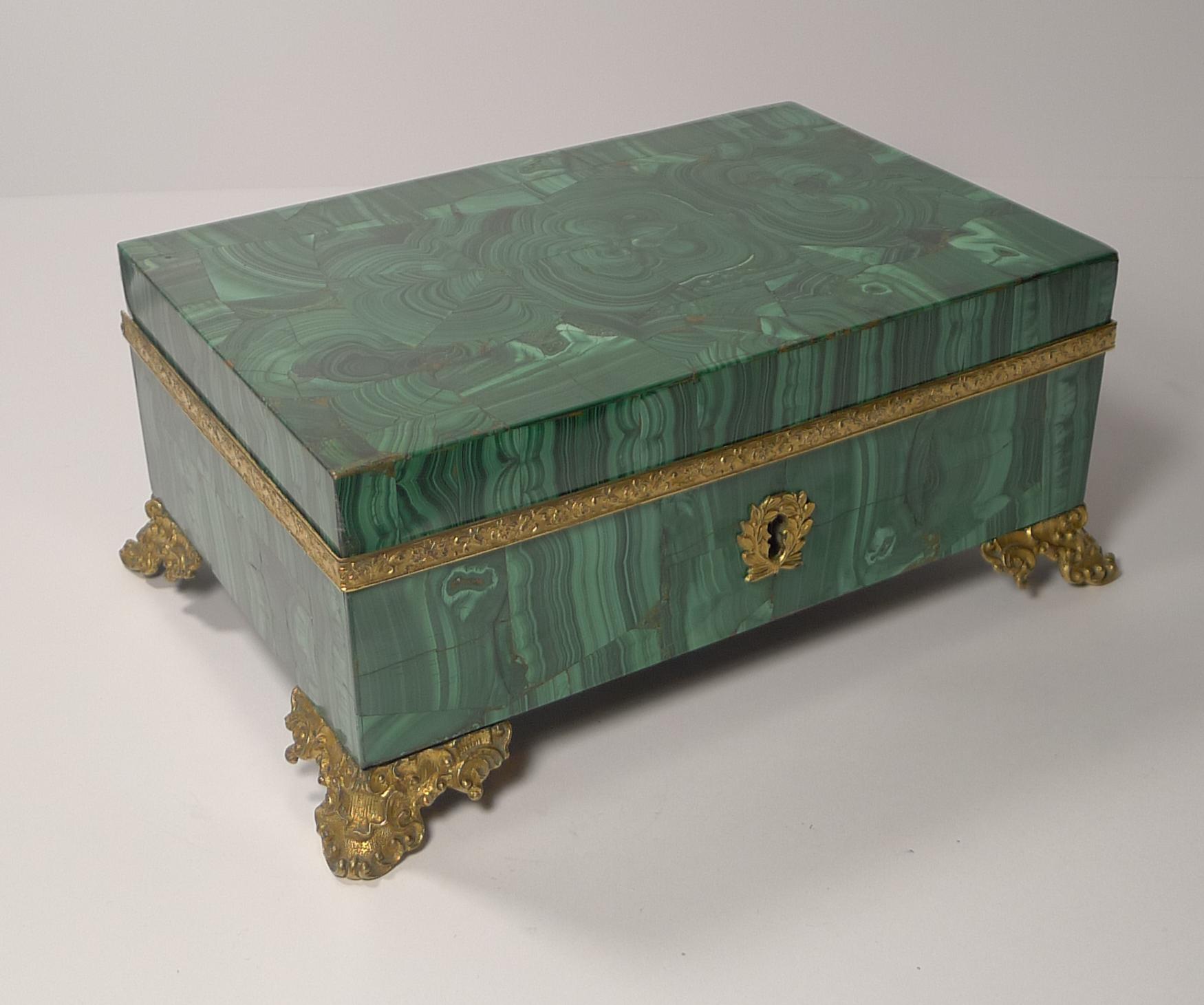 A magnificent French late 19th century Malachite jewelry box dating to circa 1890-1900, one of the best examples I have come across.

The Malachite during this era was aggressively mined in the Ural Mountains of Russia so I suspect the this stone