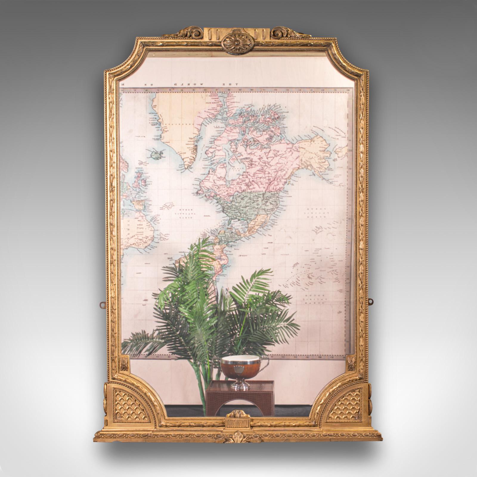 This is a grand antique overmantle mirror. An English, giltwood wall mirror in Italianate taste, dating to the early Victorian period, circa 1850.

Enhance your chimney breast wall with this generous mirror
Displays a desirable aged patina and in