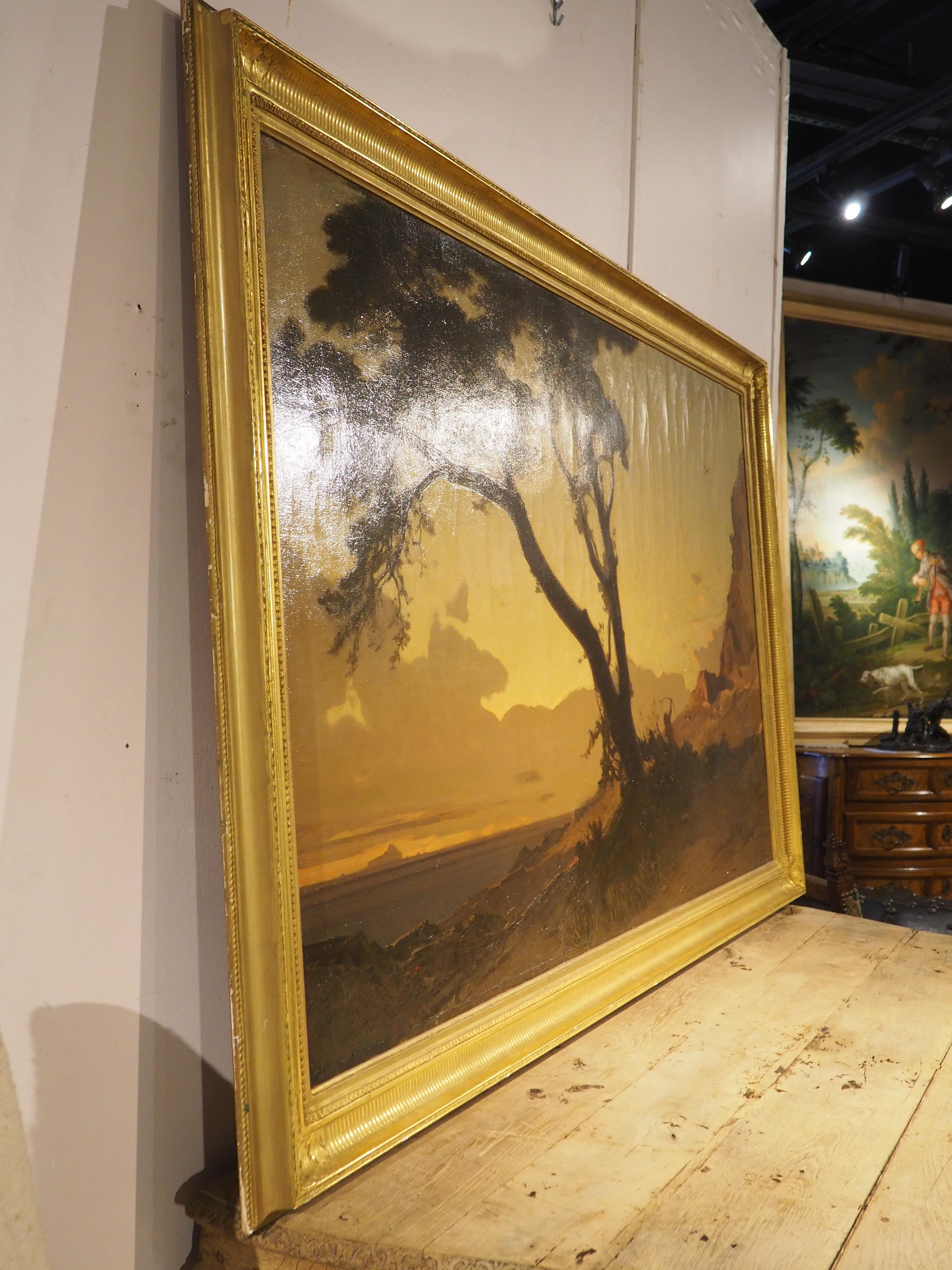Fantástica pintura paisajística de un cazador con arco y flecha siguiendo a un halcón al atardecer, esta gran obra de arte (~6 pies de ancho) de Étienne Duval se presenta en un marco de madera dorada estriada y foliada. Duval hizo un trabajo