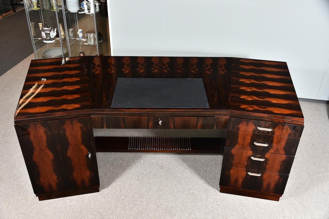 Art Deco Style table is made out of high quality walnut wood. It composed out of 2 spacious comportments with lots of room/drawers for storage. Both compartments are connected with each other by wooden part, that could serve as a leg support. The