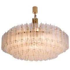 Grand lustre en verre structuré et laiton