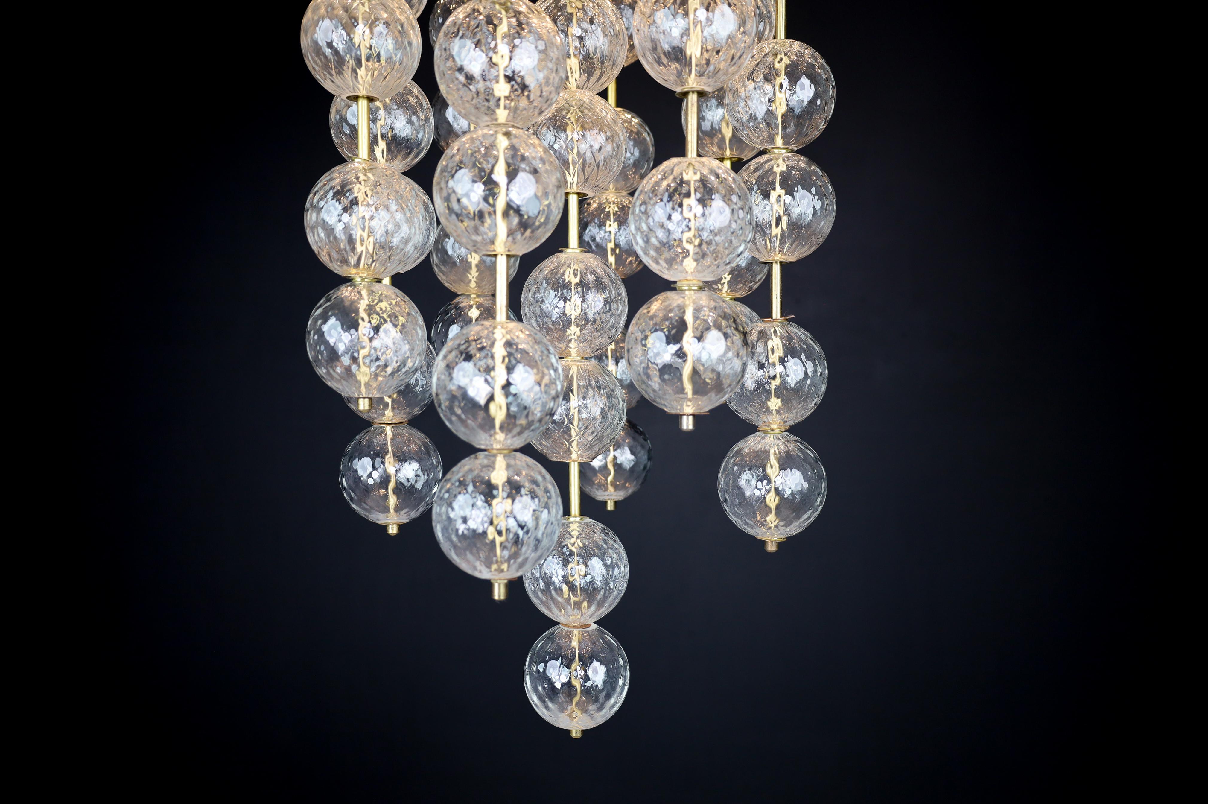 Grand Chandelier with Brass Fixture and Hand-blowed Glass Globes, 1960s For Sale 9