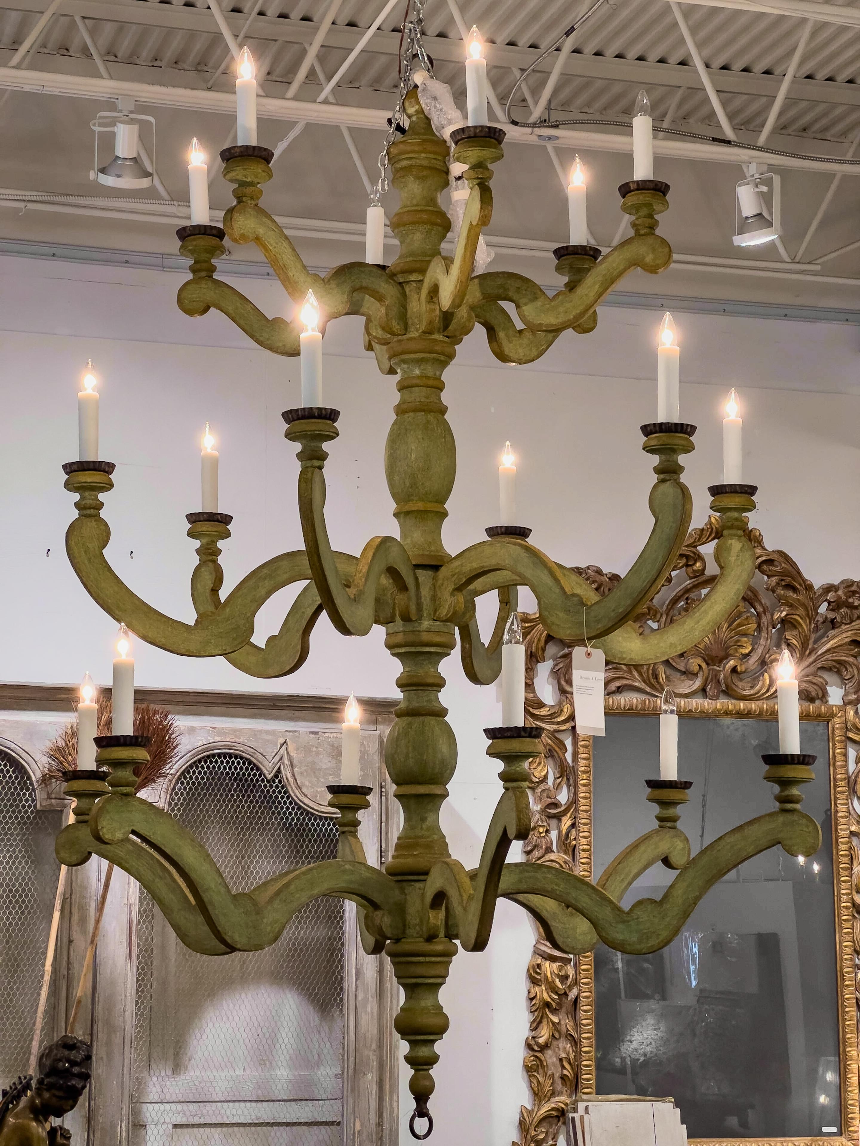 Grand Country French style custom 3-tier Wooden Chandelier with 18 lights, a turned central column, and shaped arms.

Chandelier for an amazing large location! For someone who wants to make a grand statement! 

All new construction by Dennis & Leen.