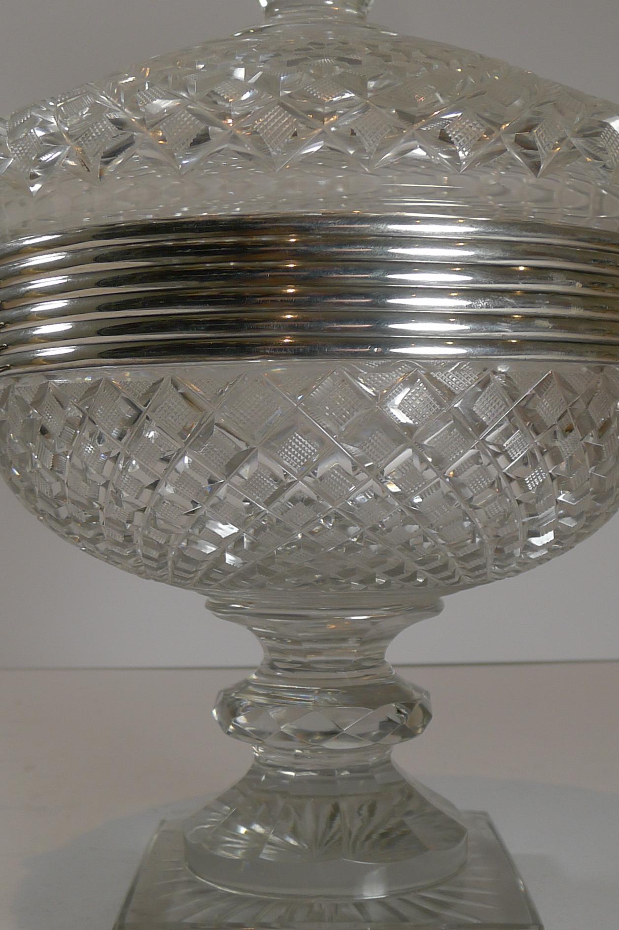 An outstanding large covered bowl or dish made from heavy hand-cut crystal, a true grand centrepiece.

The Dutch silver mount is marked with the single sword mark used between 1814 to 1905; this piece dating to c.1880. The fabulous cast silver