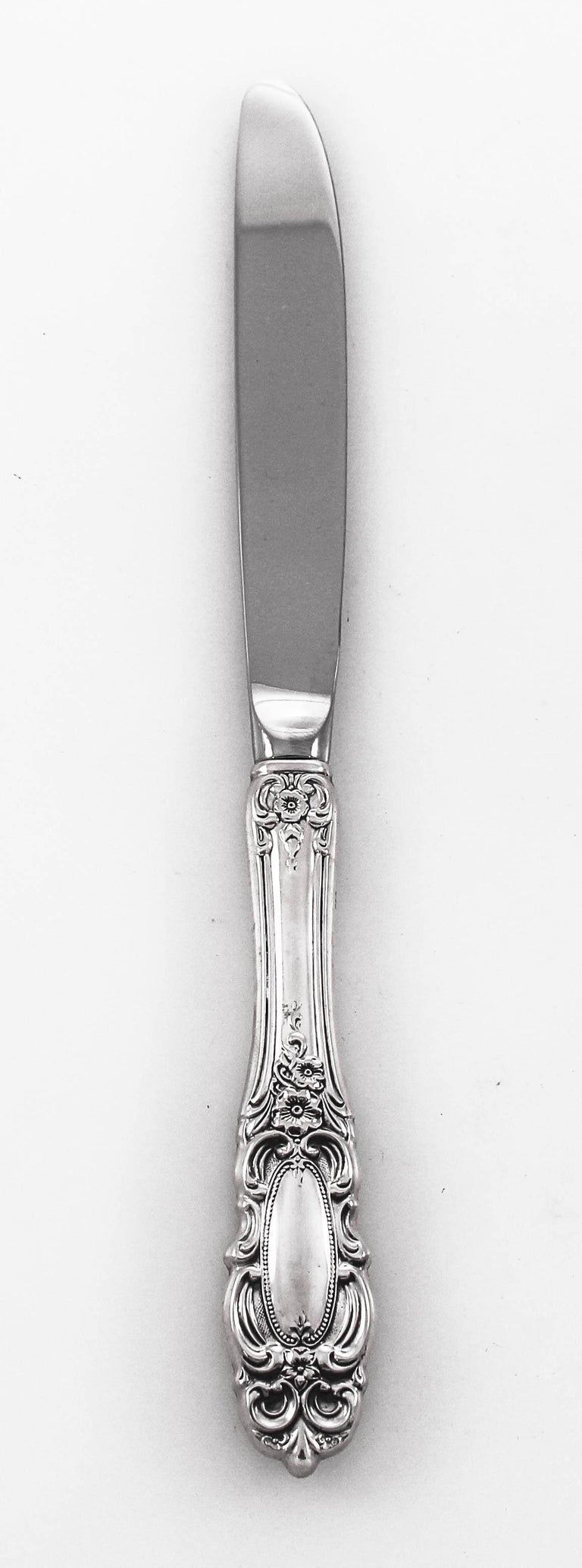 This sterling silver dinner size set of Grand Duchess by Towle Silversmiths is a Classic and will never go out of style. Included are 12 settings, 5 pieces each: dinner fork and knife, oval soup spoon, salad fork and dessert spoon. There are flowers