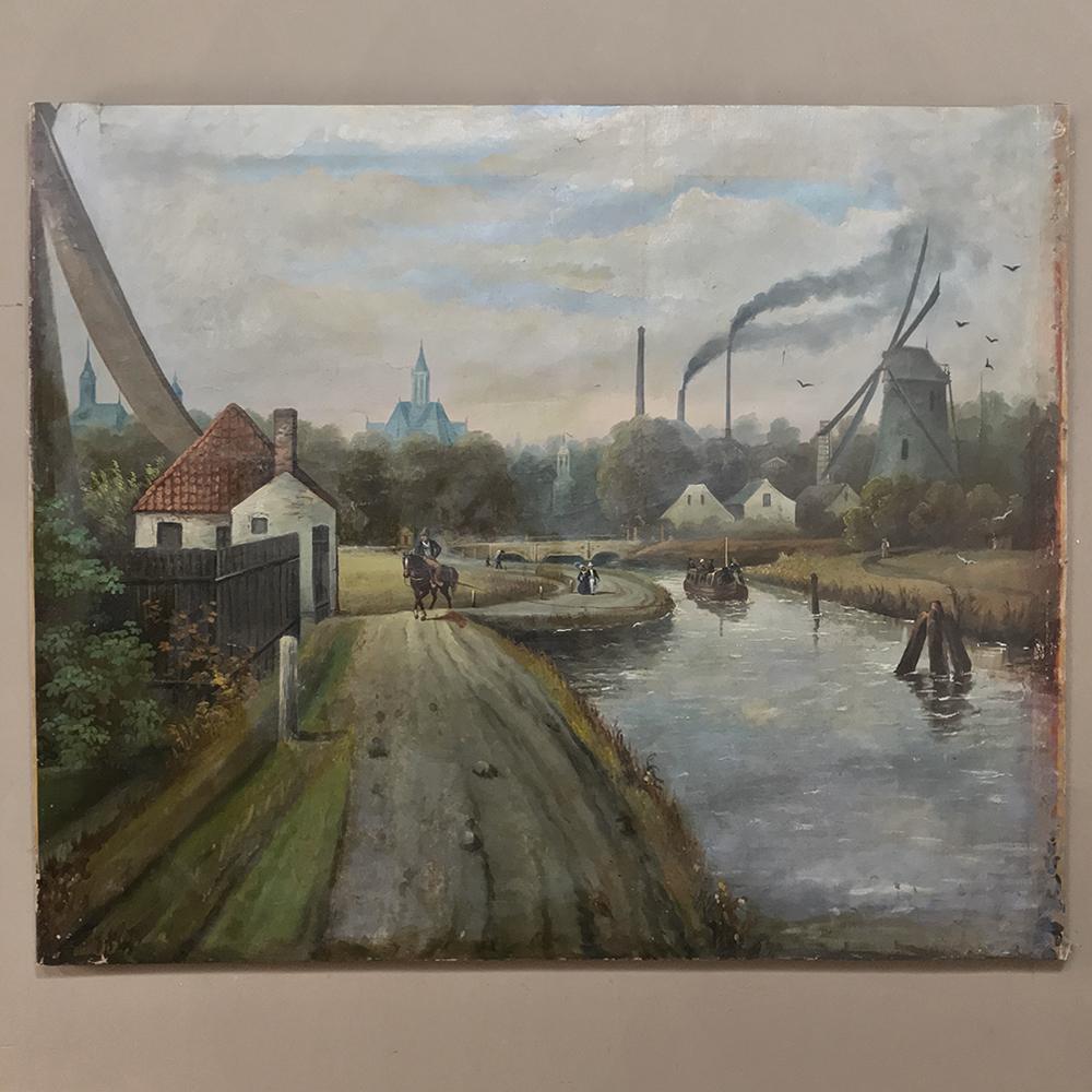 Grand Dutch landscape oil painting on canvas depicts a late Industrial age scene with the dichotomy of old and new represented by the windmills in the scene with coal burning factories in the background. Pedestrians and an equestrian appear side by