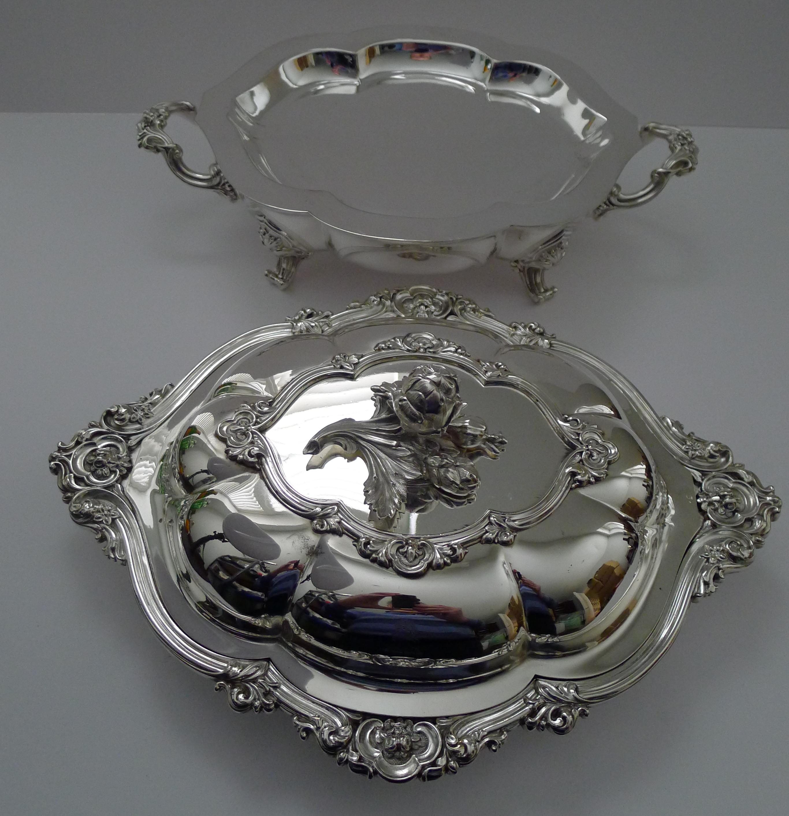 About as grand as they get, this is a rare early Victorian silver plated Entree / Chafing dish in silver plate by the top-notch silversmith, Elkington Mason & Co. 

The dish comes in four pieces, the footed base to store hot water to keep the