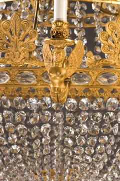 Grande lampadario francese impero del XIX secolo in bronzo e cristallo