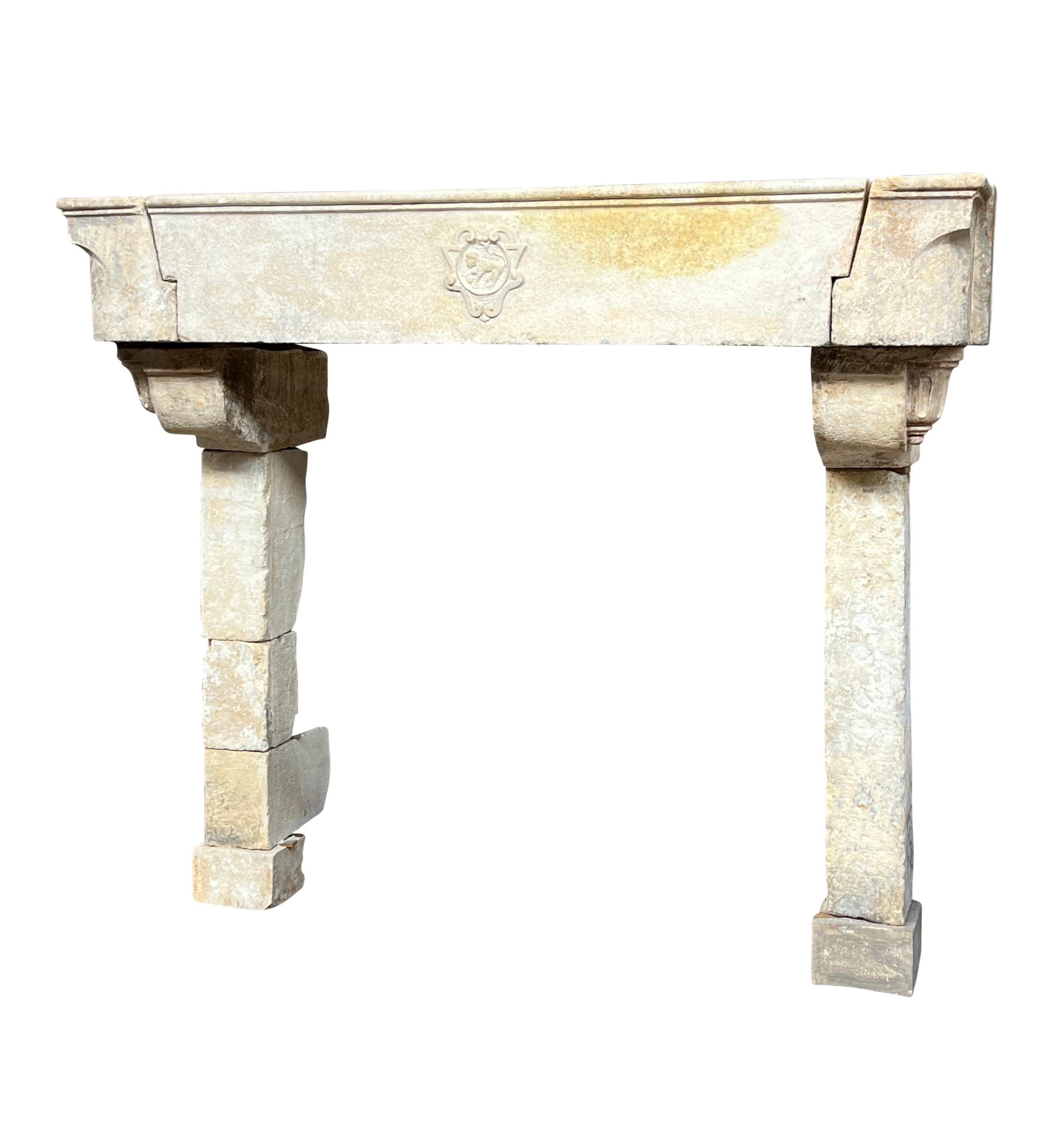 Grand French Cottage Chateau Fireplace In Limestone With Lion Detail In Good Condition For Sale In Beervelde, BE