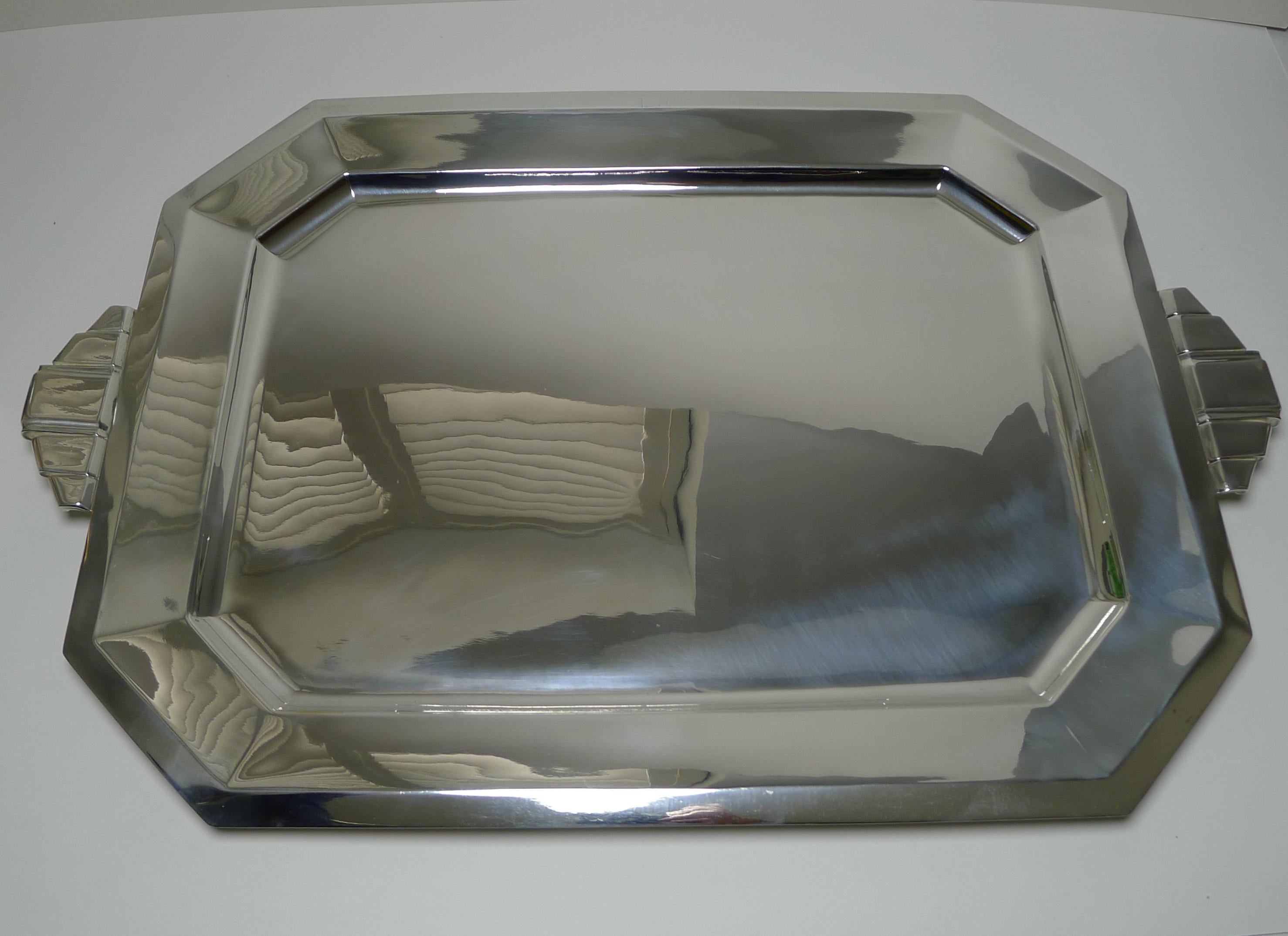 A magnificent and stylish French Art Deco Drinks or serving tray.

Just back from our silversmith's workshop where it has been professionally cleaned and polished, restoring it to it's former glory, minor wear commensurate with age.

The mark