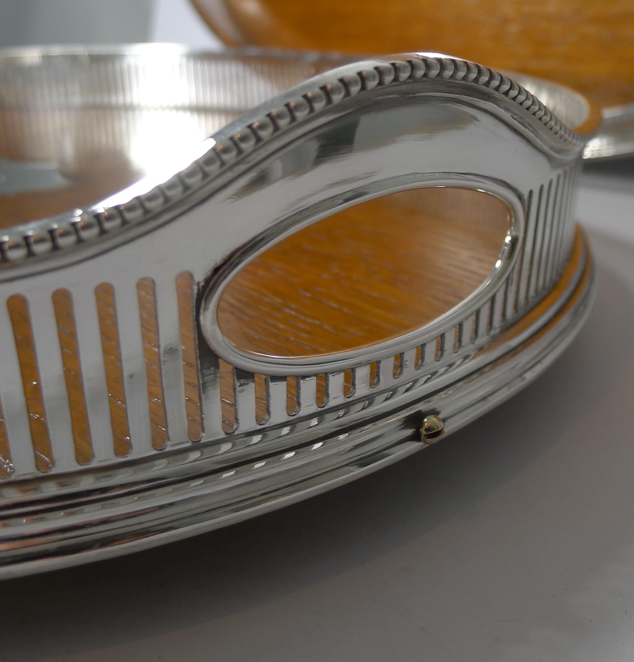 English Grand Graduated Pair of Late Victorian Oak and Silver Plate Serving Trays