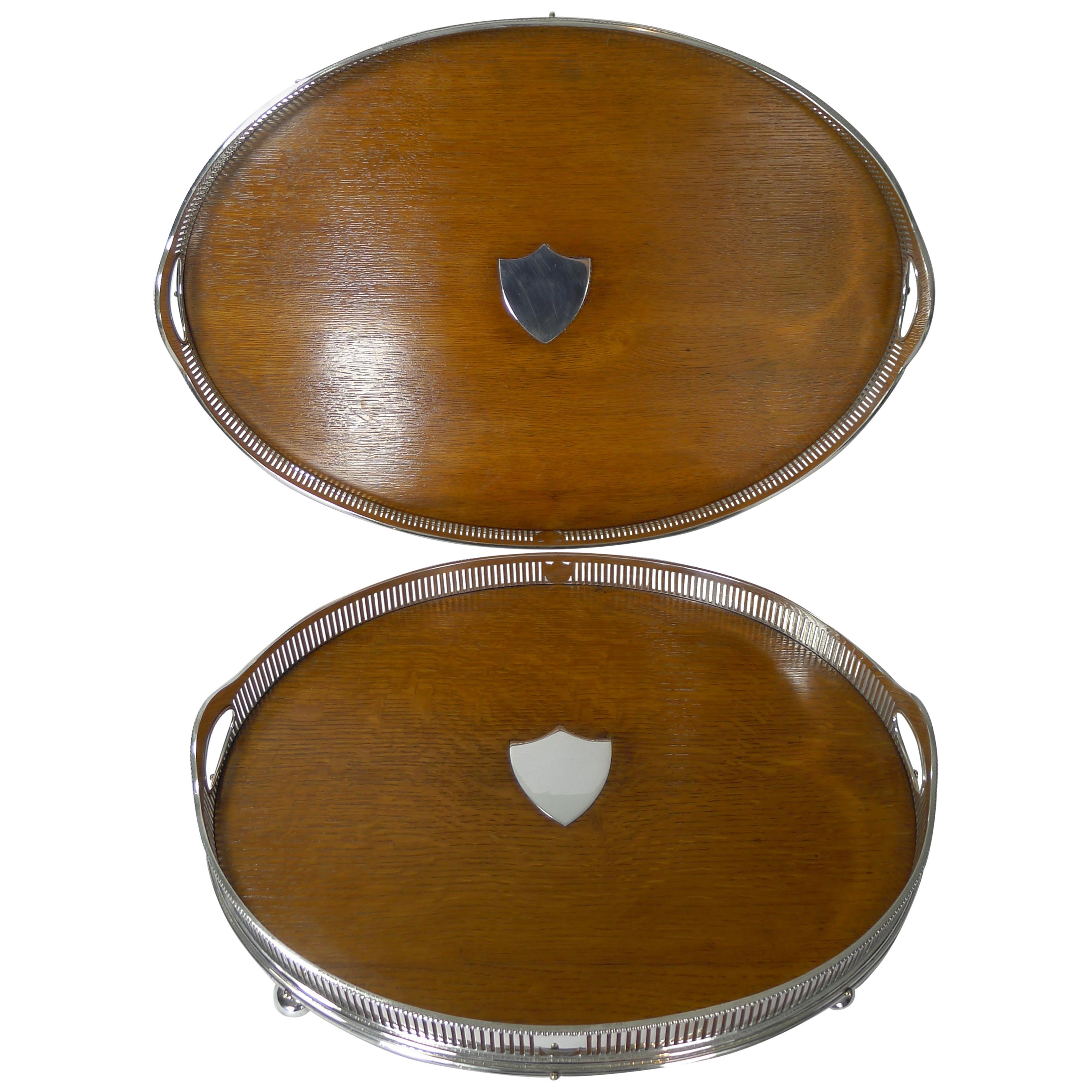 Grand Graduated Pair of Late Victorian Oak and Silver Plate Serving Trays