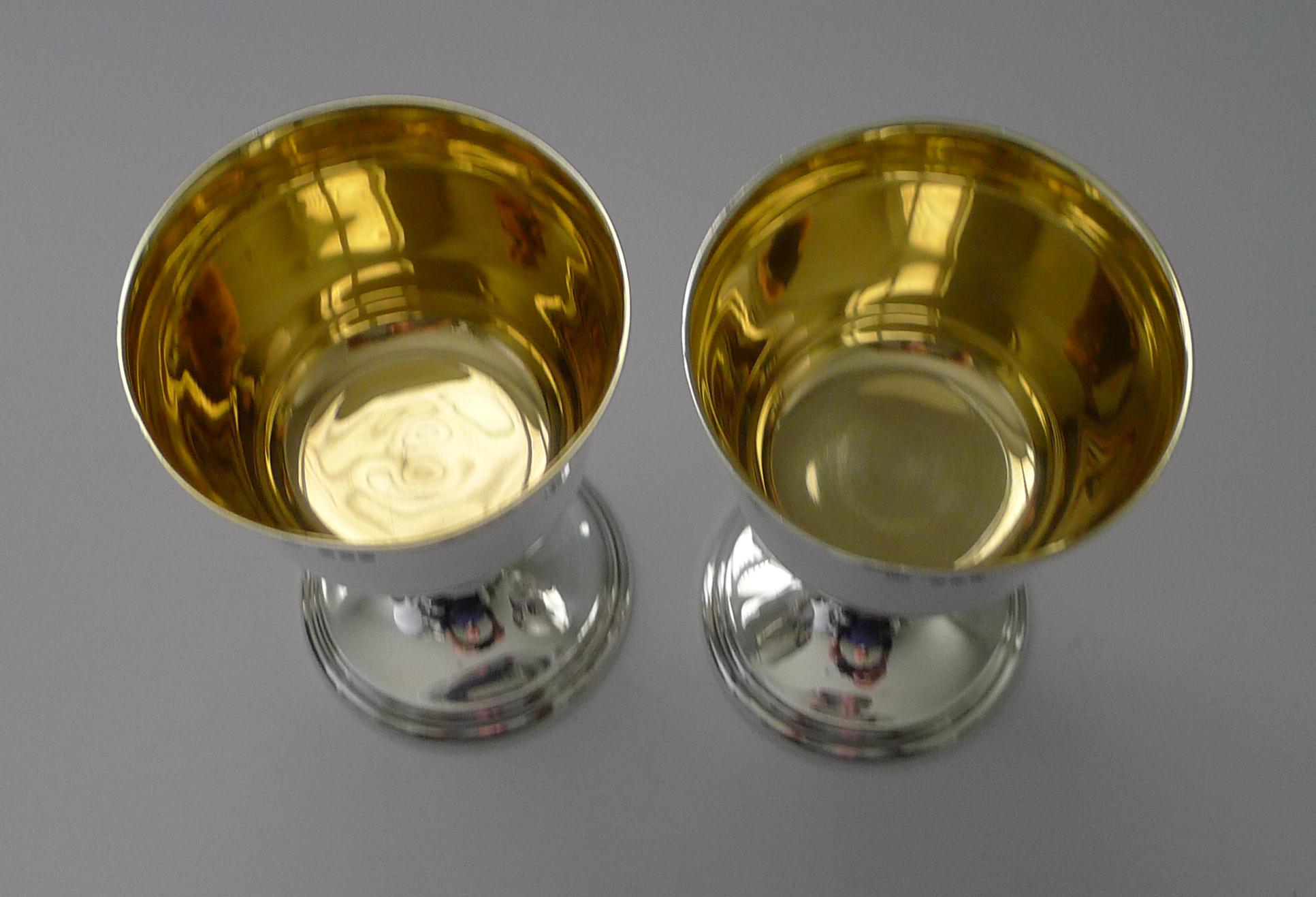 A magnificent pair of vintage solid sterling silver wine goblets, a good size, each standing 5 1/2