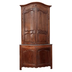 Grand Louis XV walnut corner cupboard