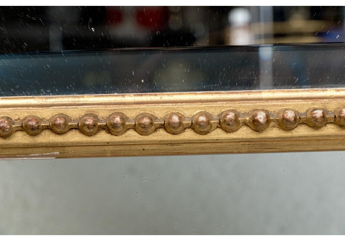 Grand Louis XVI Style Segmented Giltwood Mirror For Sale 8