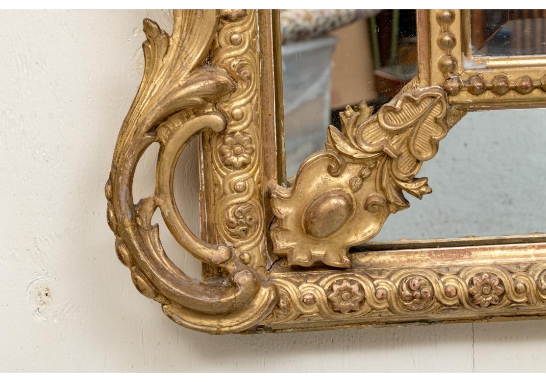 Grand Louis XVI Style Segmented Giltwood Mirror For Sale 1
