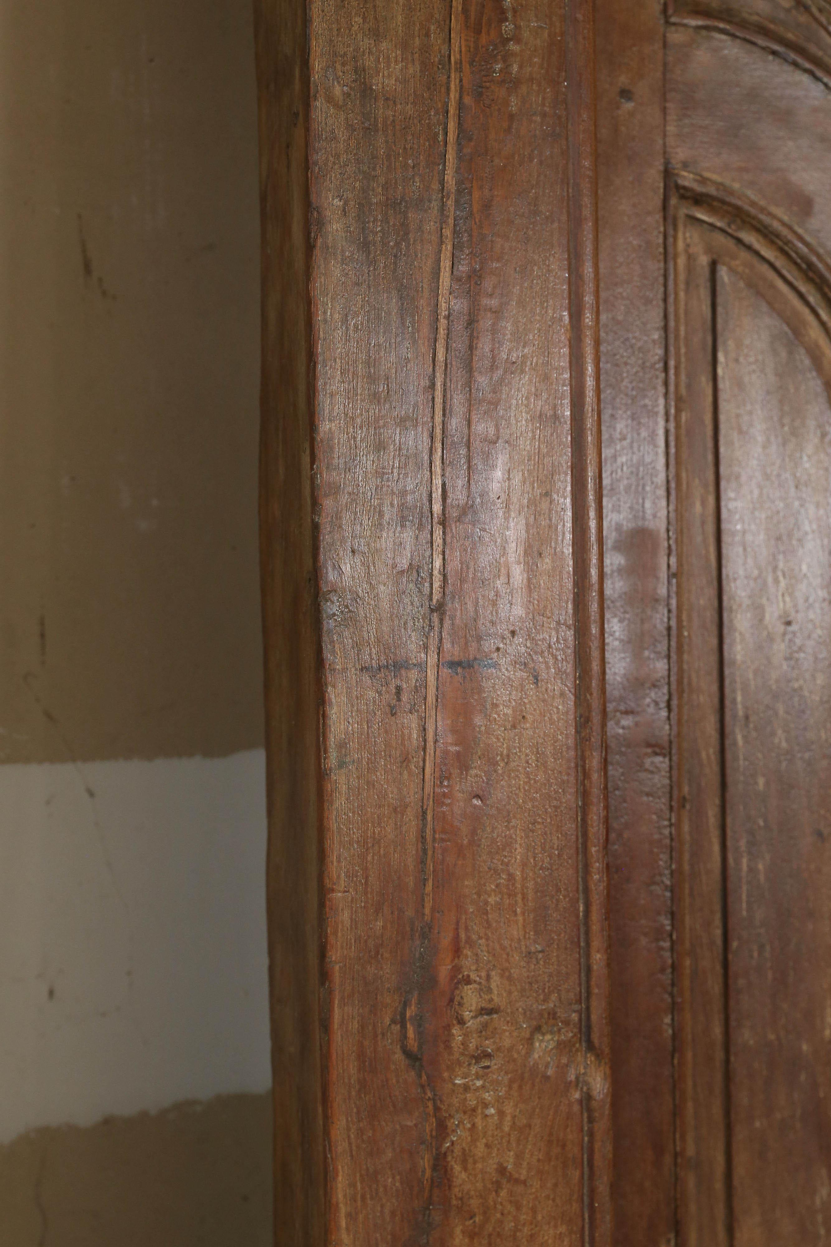 Anglo Raj Grand Mid-19th Century Solid Teak Wood Entry Door from a Colonial Mansion For Sale