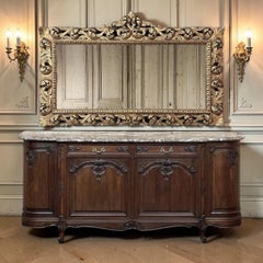 Grand miroir baroque italien du milieu du siècle en bois doré percé