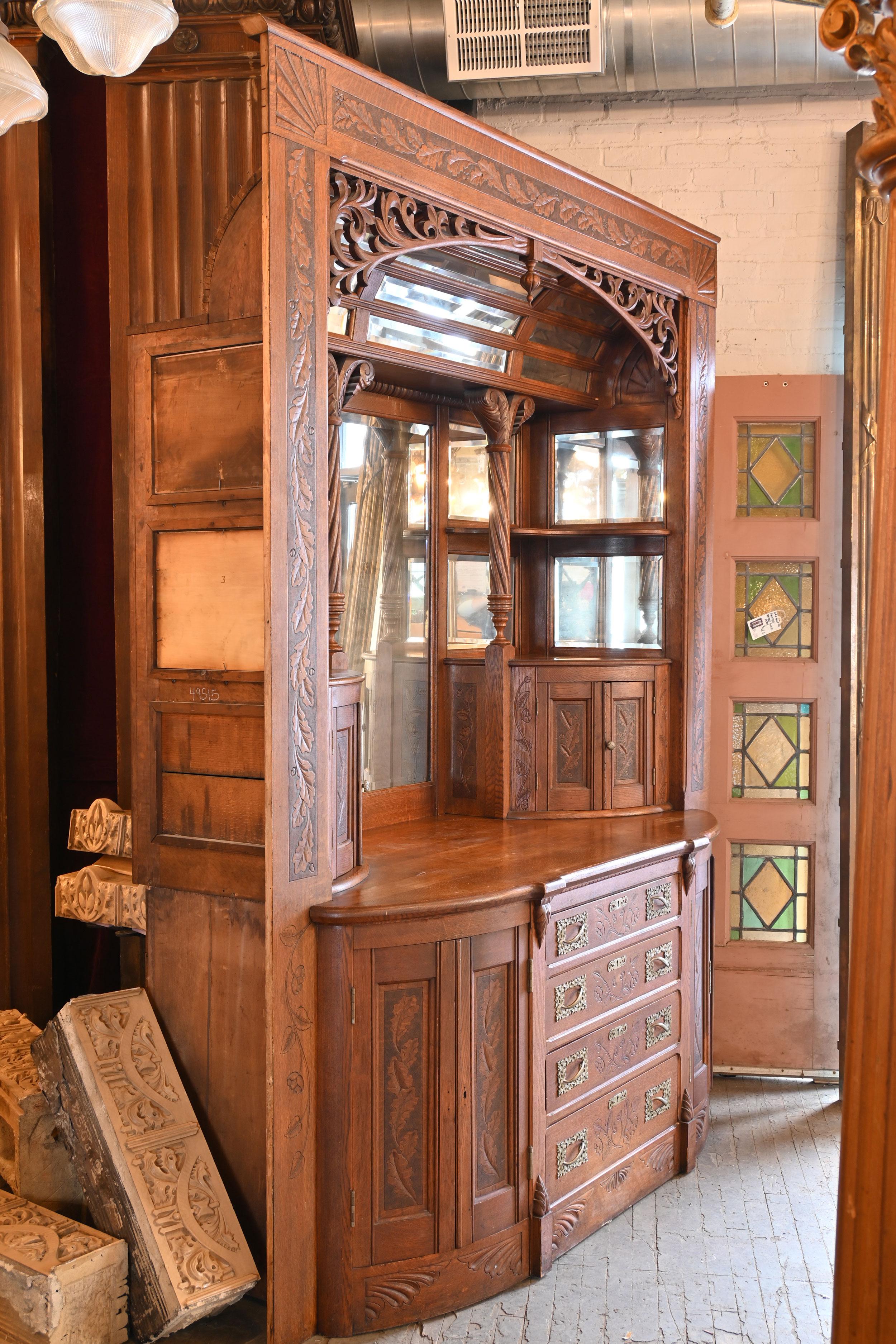 With its sunburst corner design and vanity perfect mirror, the beauty of this buffet wakes you up and says “Good morning!” This piece was salvaged from a Queen Anne style home designed by Charles A. Wallingford and can be put in the category of