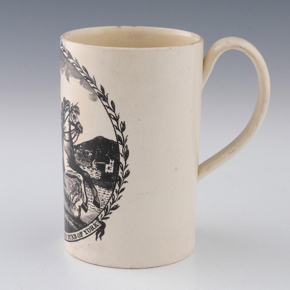 Heading : Grand Old Duke of York Prince Frederick Creamware Mug
Date :c1794
Period : George III
Marks : None
Origin : Staffordshire
Colour : Transfer printed
Features : Named depiction of His Royal Highness The Duke of York
Condition : Very