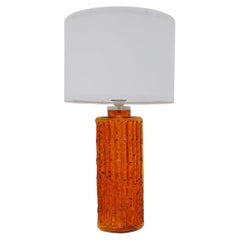 Grand orange glass table lamp. By Gustav Leek for Orrefors, Sweden