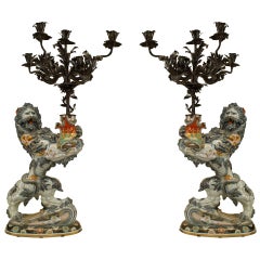 Antique Pair of French Porcelain Lions Holding Wrought Iron Candelabras