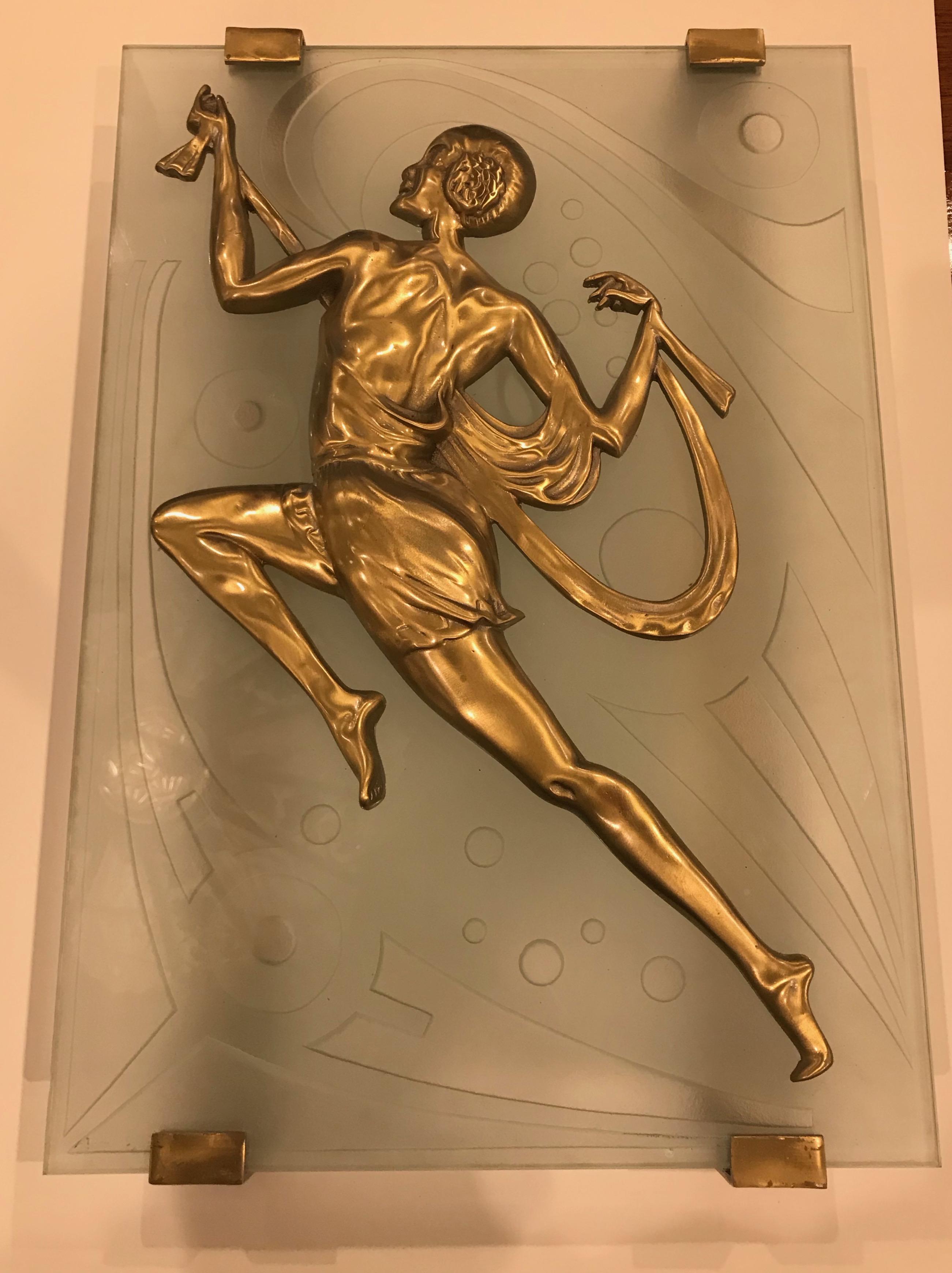Pair of French Art Deco style wall sconces. Beautiful brass female dancers on carved deco glass. Beautiful deco details throughout. Has been rewired for American Use. Each sconce takes two candelabra bulb (60 Watt max each bulb).