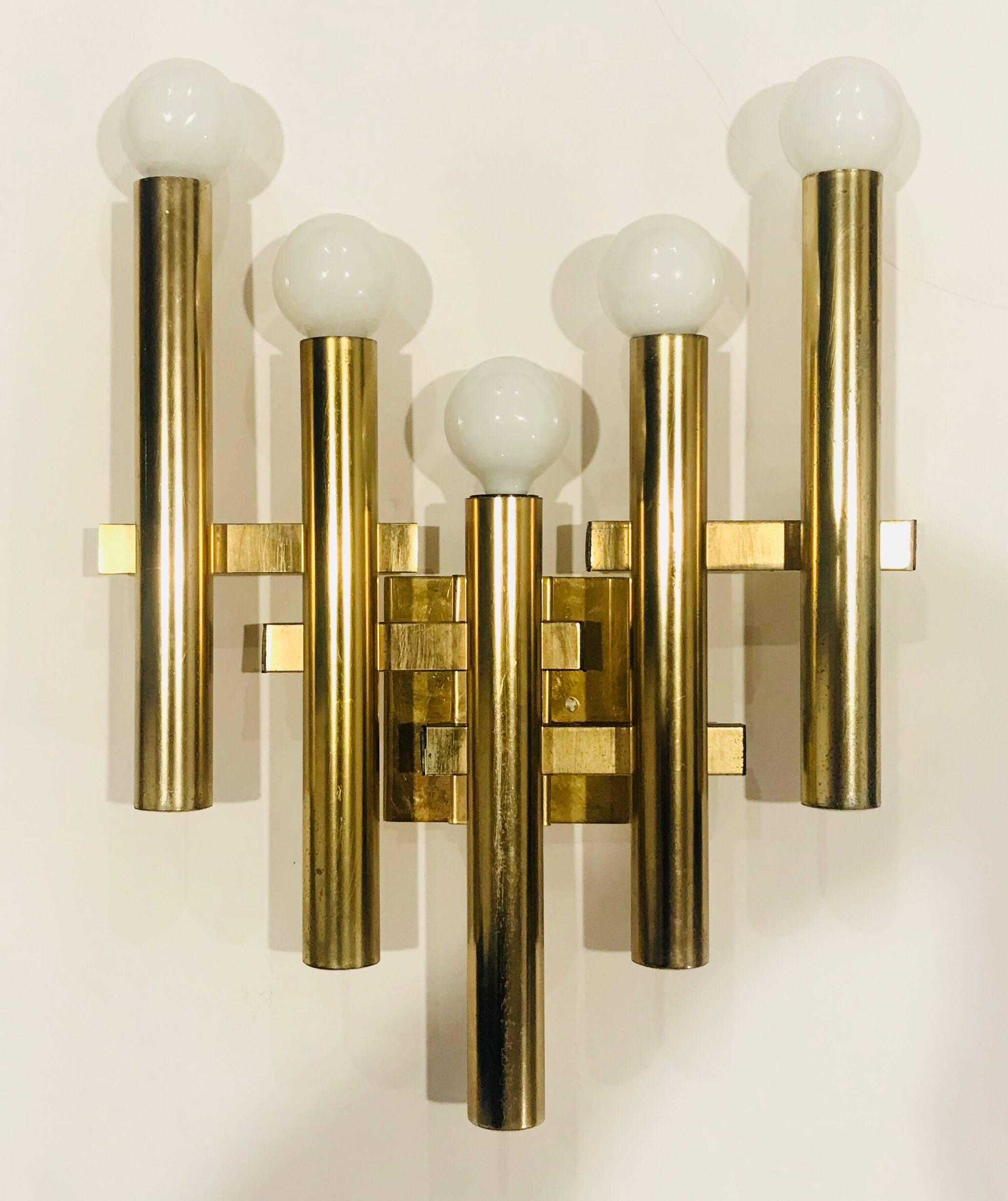 A pair of rare large aged brass scuptural wall lights by the Italian lighting maker, Sciolari. Five E12 candelabra 60 watt sockets each. Newly rewired with matching backplates.