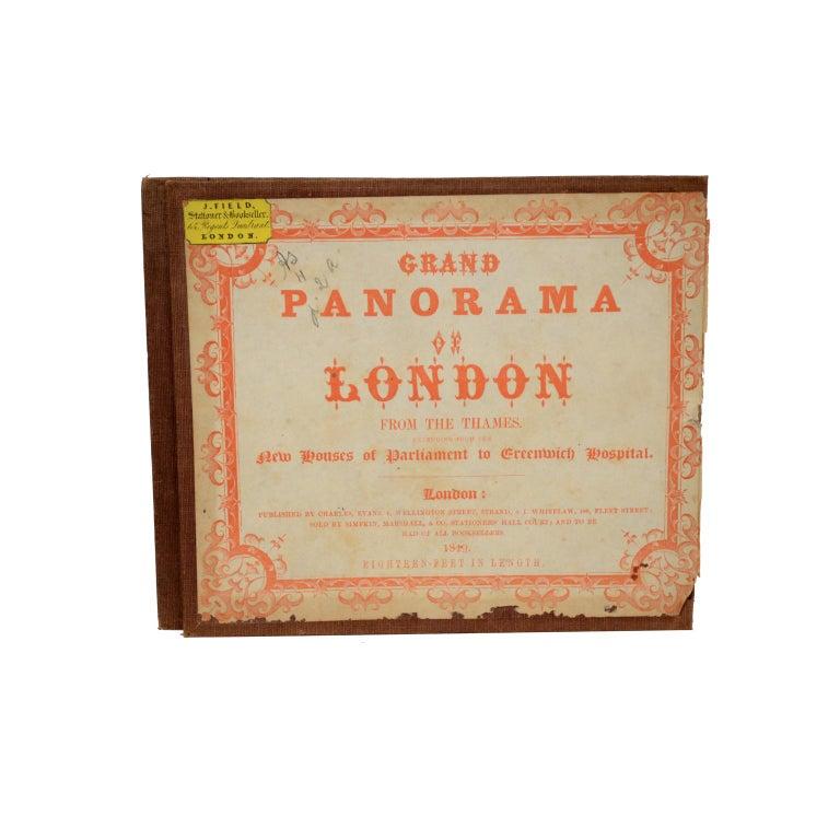 Grand Panorama of London, a very special map of London seen from the Thames, published by Charles Evans and I. Whitelaw in 1849, realized on a long single strip of printed paper folded into a booklet with fabric cover and gold colored letters. Good