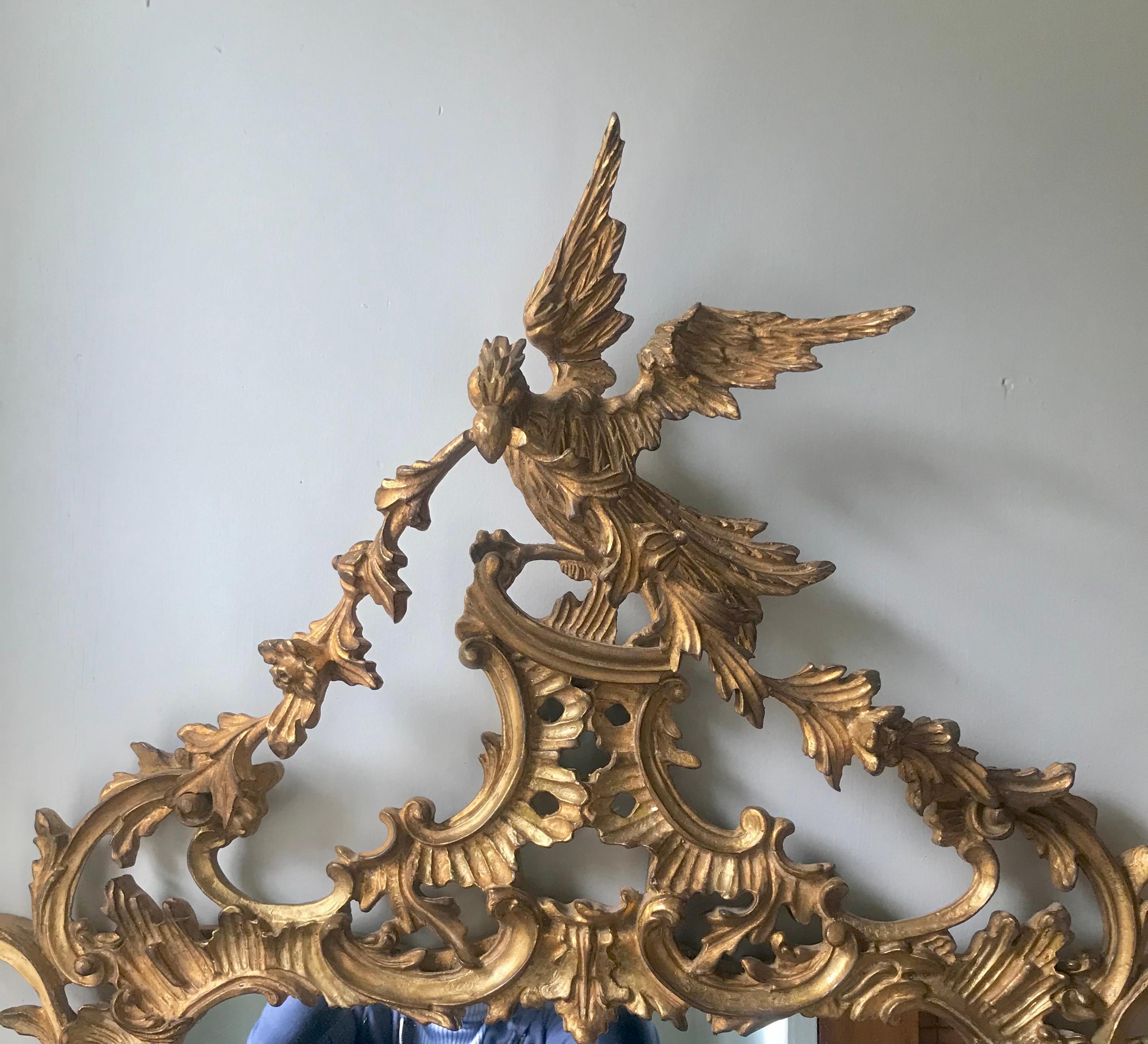 A Magnificent Chippendale design of the 18th century. This Grand Phoenix Chippendale mirror is an impressive 80 