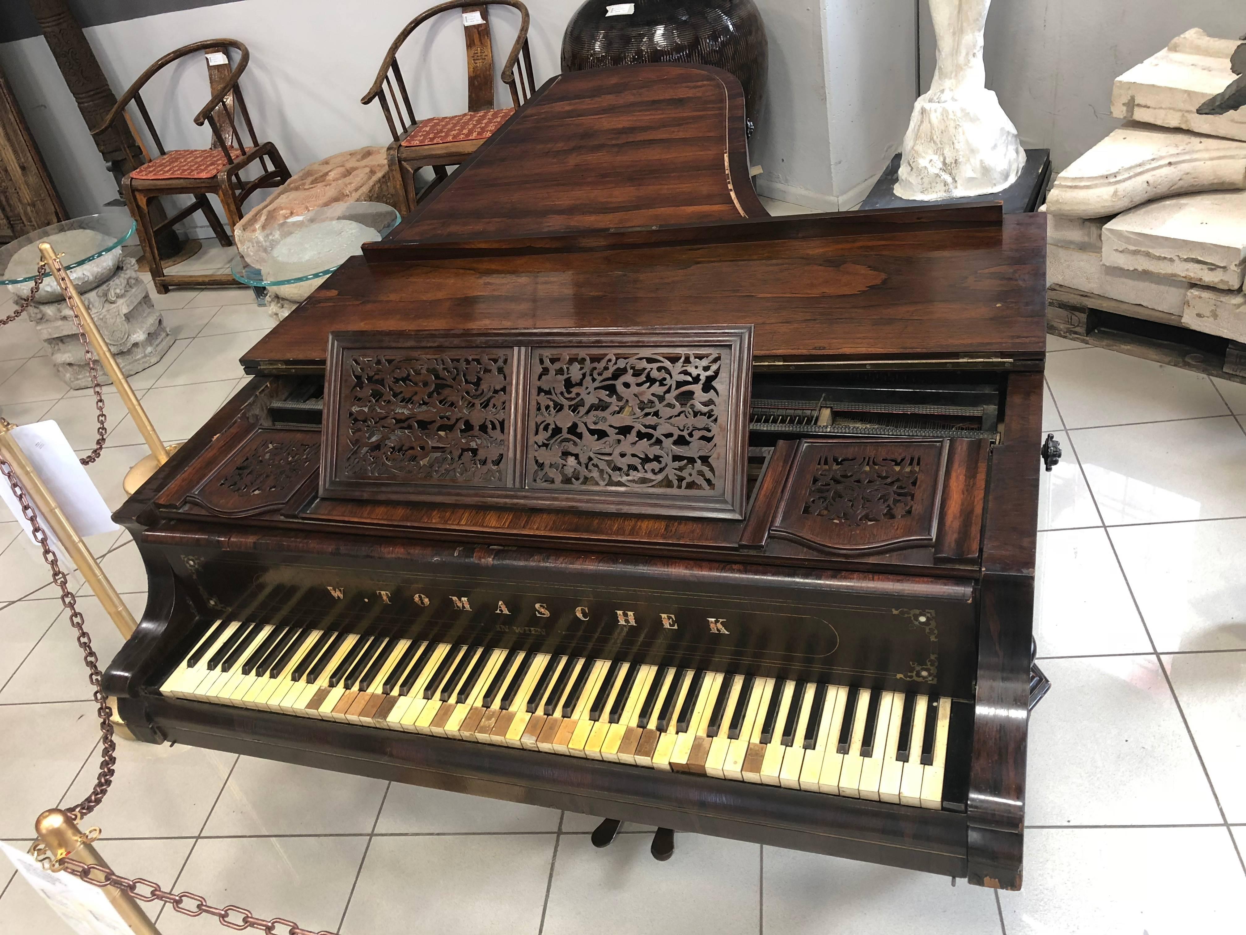 Mid-19th century Viennese piano. Keyboard cover bears maker's name 