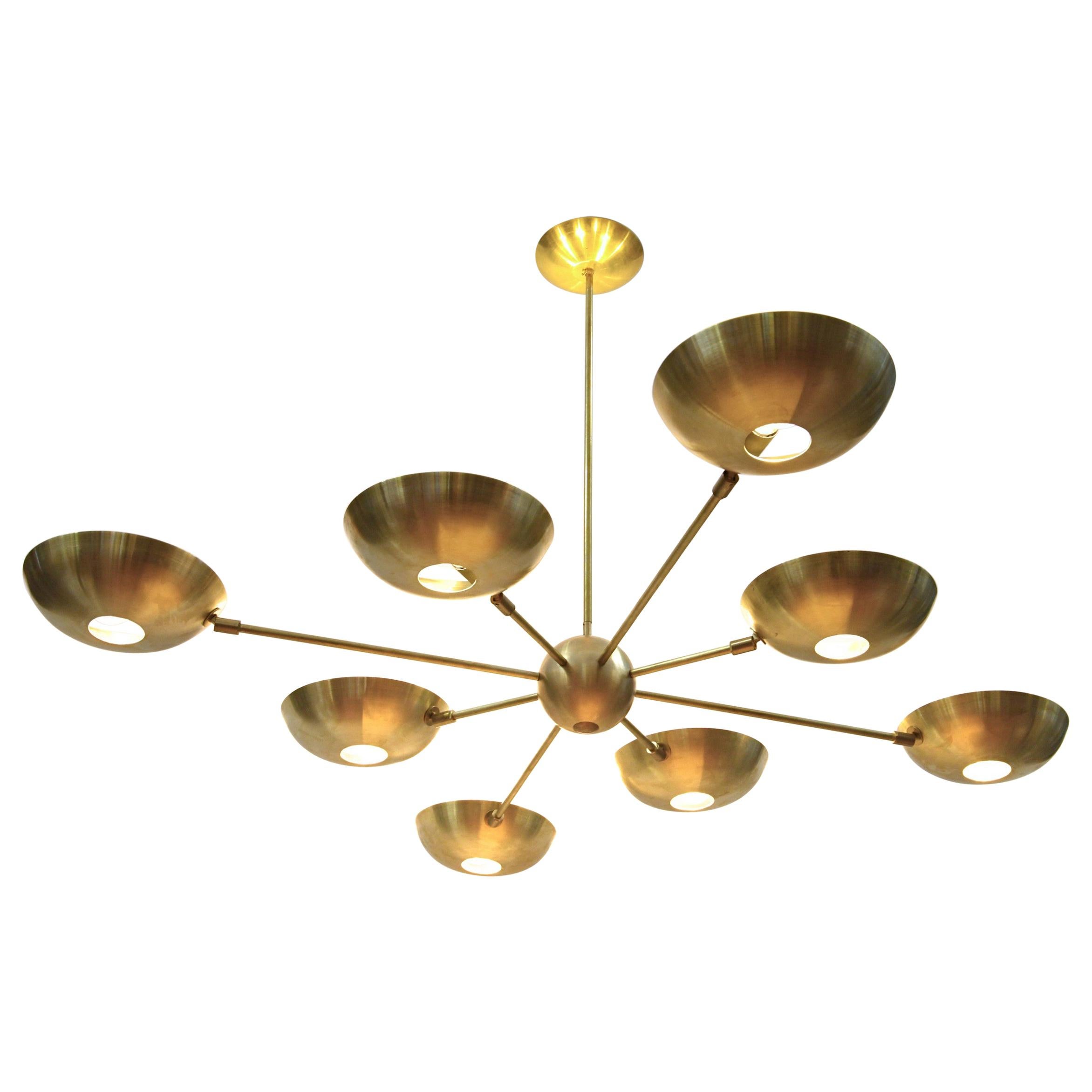 This unique chandelier is inspired by the solar system, with each arm representing a planet, and the central sphere symbolizing the sun. It has a diameter of 60 in. (152 cm).
The chandelier is versatile enough to accommodate low ceilings, as its