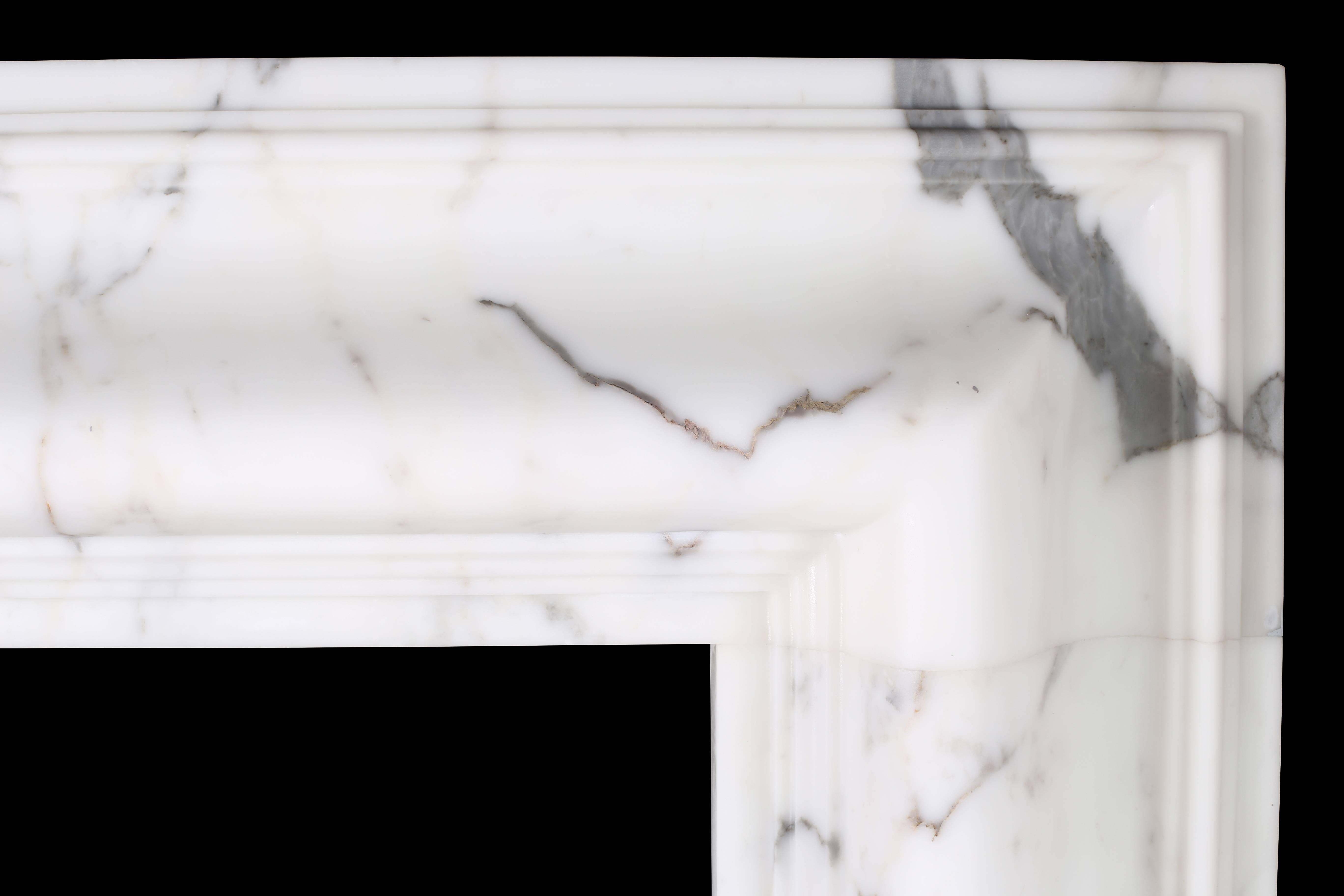 A grand Queen Anne style bolection fireplace in Italian statuary marble nr. 2.

Measures: Depth 4 1/2