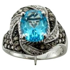 Bague de vente grand échantillon avec topaze bleue et diamants chocolat