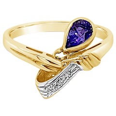 Grand Sample Sale Ring Featuring Blueberry Tanzanite Set in 18 Karat Honey Gold