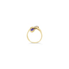 Grand Sample Sale Ring Featuring Blueberry Tanzanite Set in 18 Karat Honey Gold