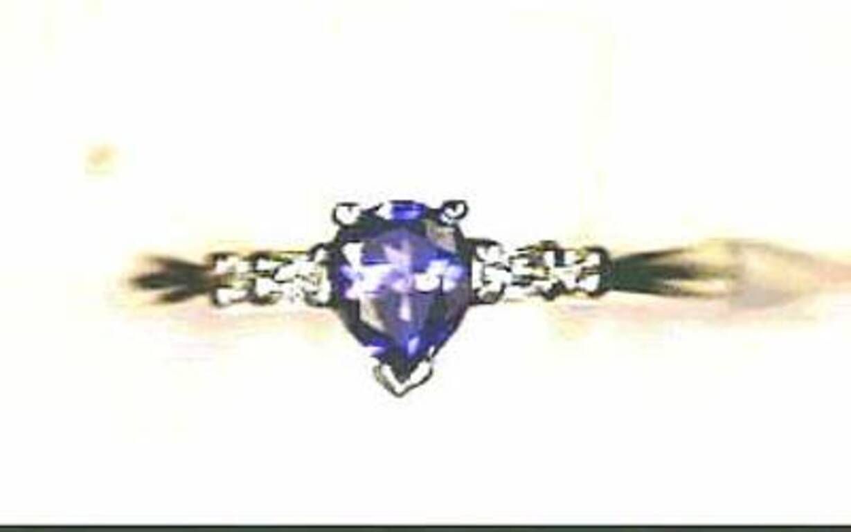 Grand Sample Sale Ring Featuring Blueberry Tanzanite Set in Platinum For Sale