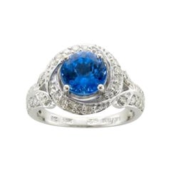 Anillo de la Gran Venta de Muestras con tanzanita arándano y diamantes vainilla