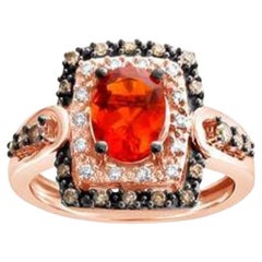 Anello di vendita del grande campione con opale di fuoco color mandarino neon e diamanti al cioccolato