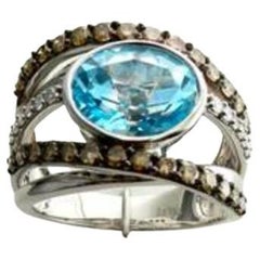 Großer Sale-Ring mit Ozeanblauem Topas und schokoladenbraunen Diamanten