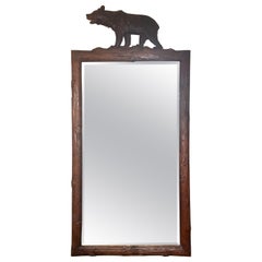 Grand Scale Antique German Black Forest Carved Walnut Beveled Mirror, Circa 1890