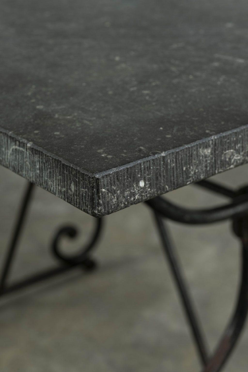 Grand-scale bluestone top iron base table circa 1880, France. Large rectangular bluestone top raised upon a 19th century forged-iron and brass scrolled-base. Maybe be used for indoor or outdoor dining, as a console table or as originally intended as