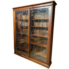 Used Grand Scale Mahogany Custom Bookcase with Leaded Glass Sliding Doors